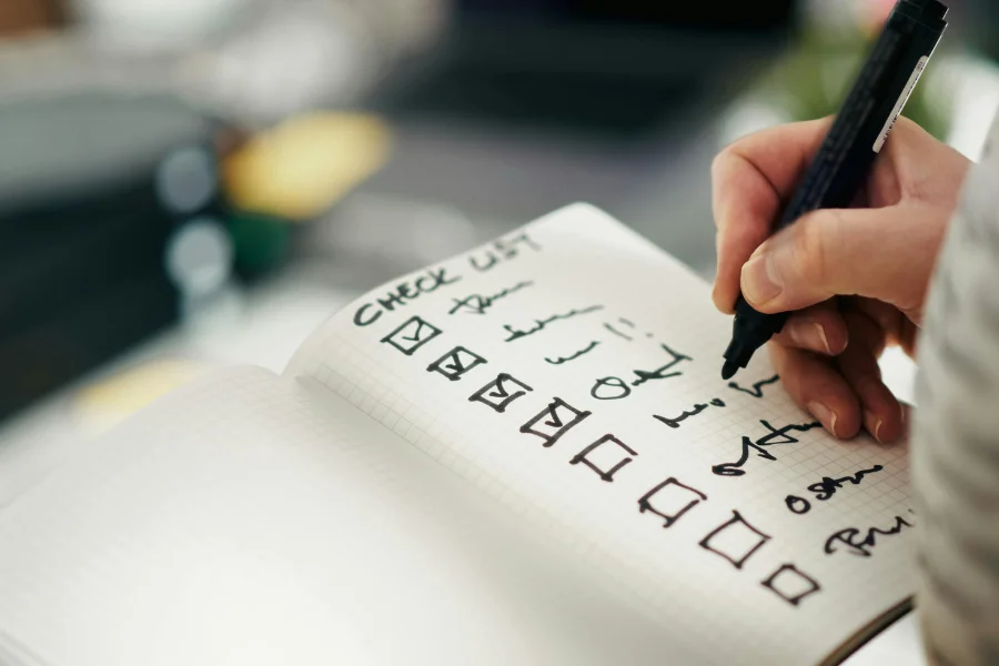 Production quality control: useful checklist (photo of a notebook with a list)