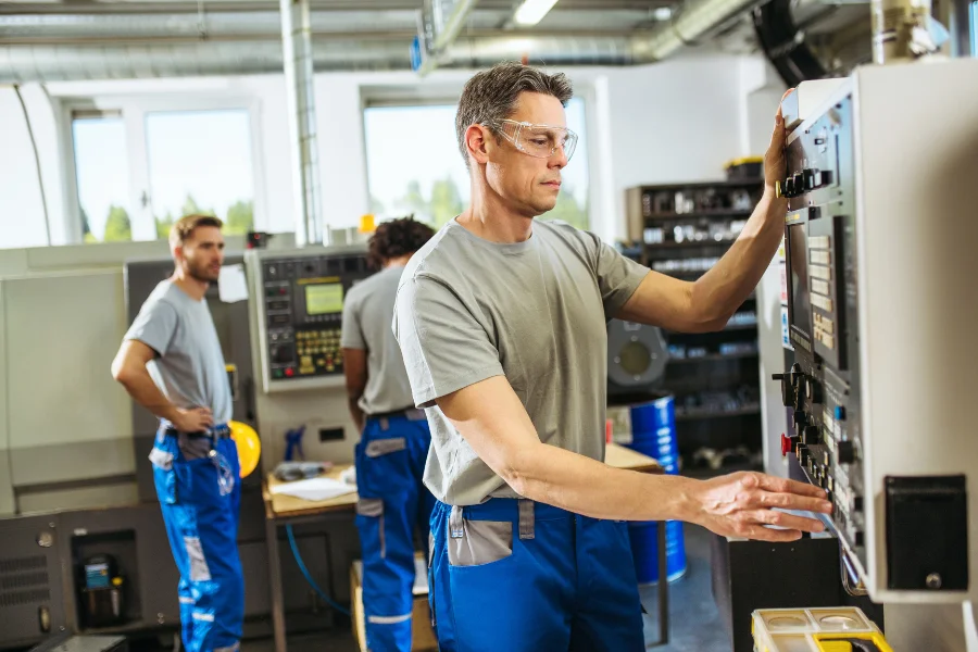 SMED Lean: What Is SMED? (photo of machine operators)