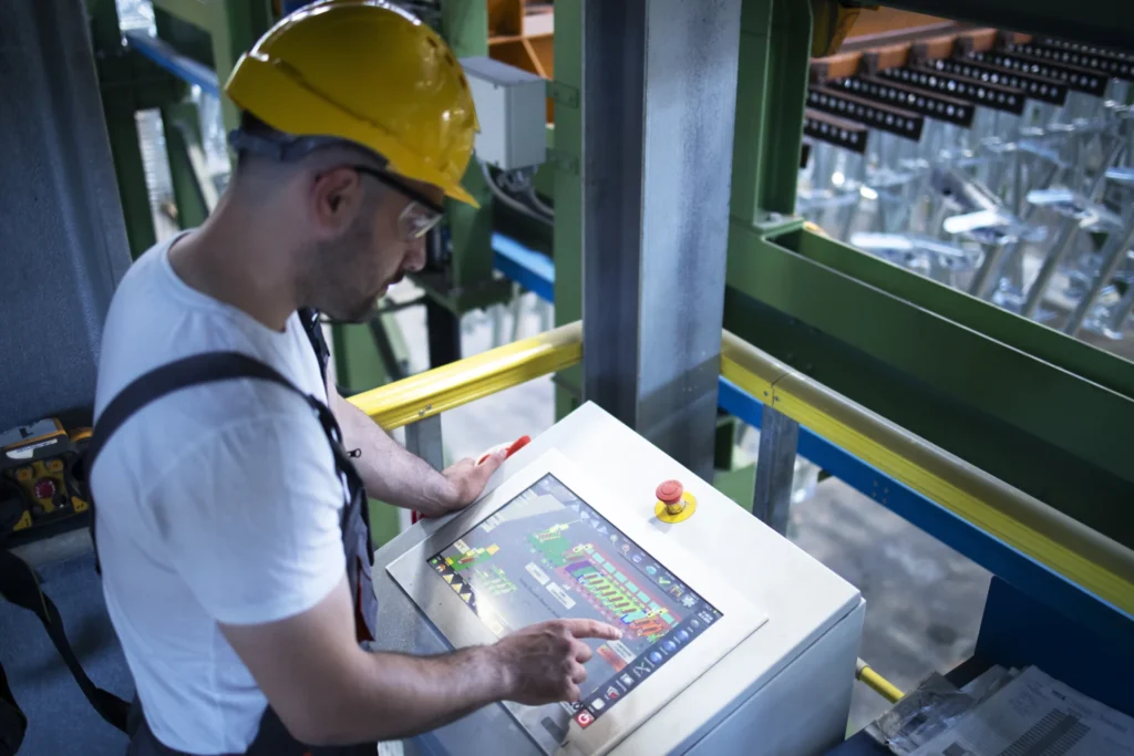 AI in Manufacturing – When Does It Make Sense?
(Employee remotely controlling machinery)
