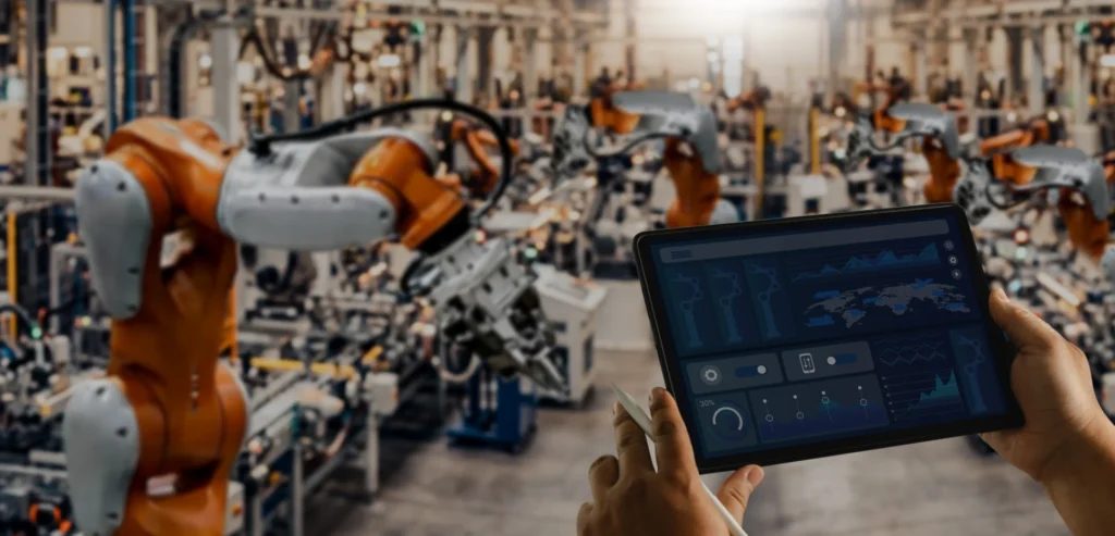 AI in production planning - when does a planner waste time? (image of hands holding a tablet analyzing a production image in an automated plant)